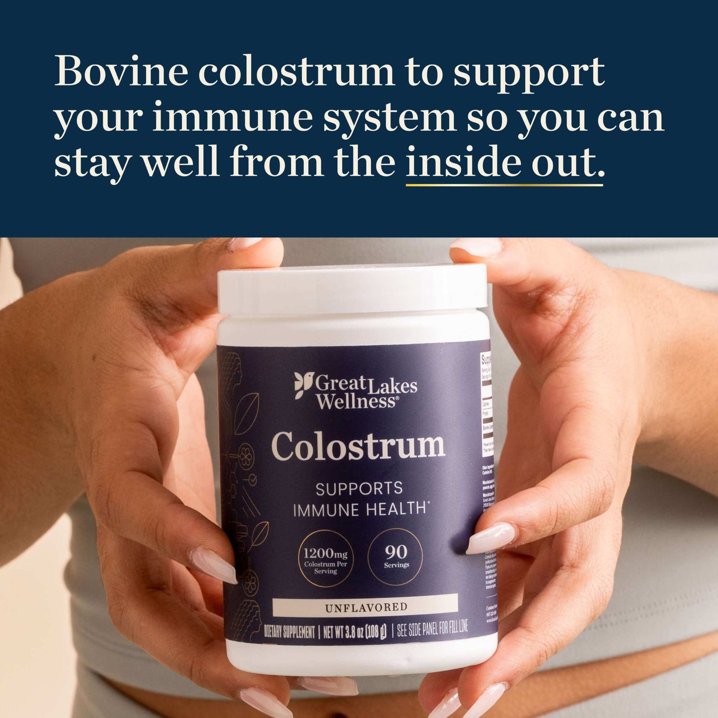Bovine Colostrum Powder container held by hands for immune health support with 90 servings and 1200mg per serving.